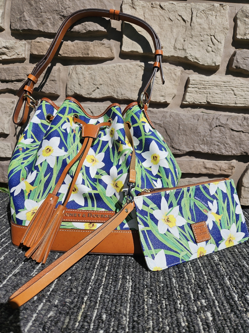 Dooney & Bourke Navy Floral Drawstring Bucket Bag with Tan Trim and Wristlet